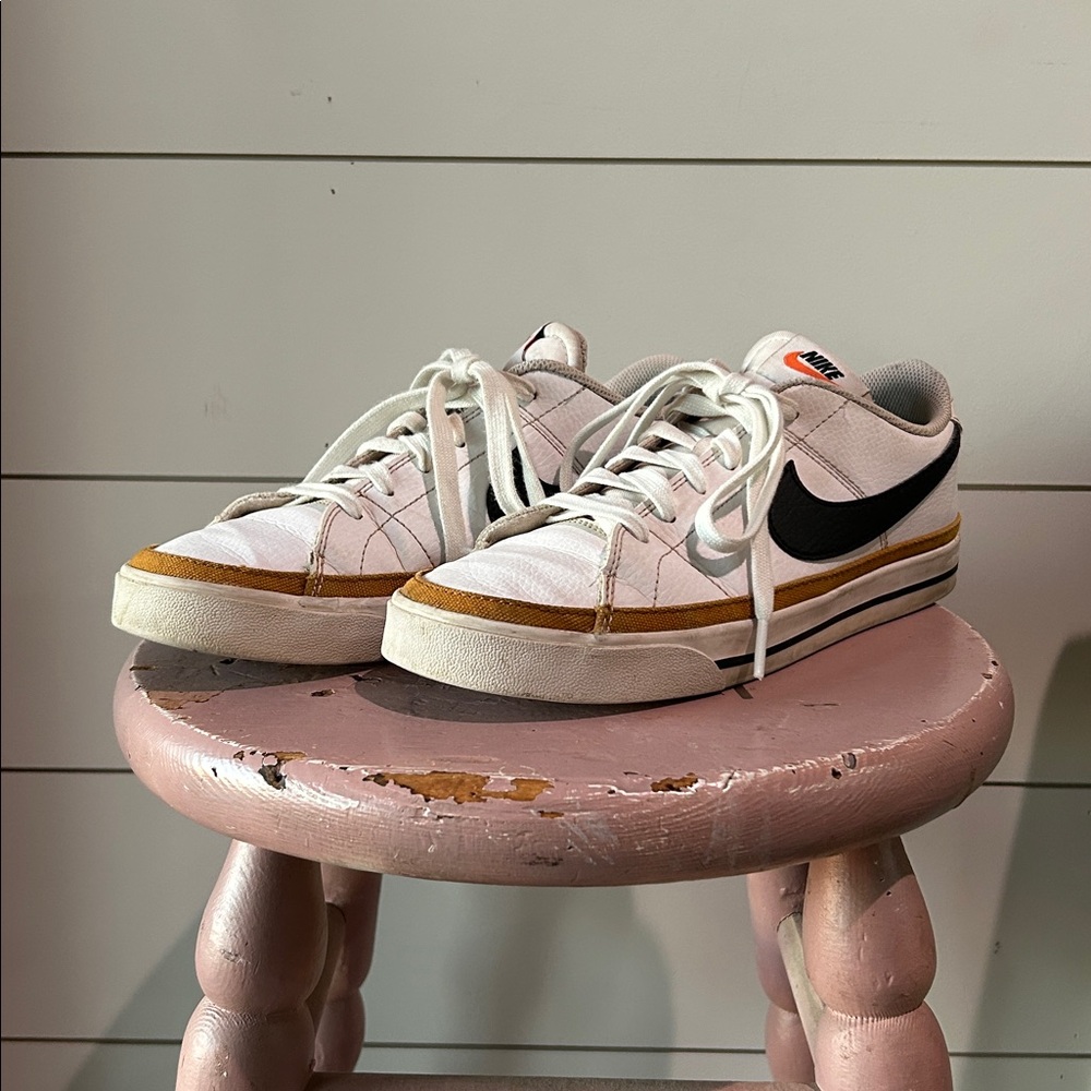 Nike White Sneakers with Black and Orange Accents